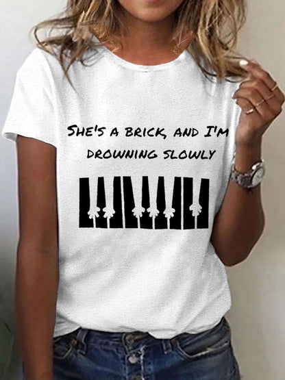 Women's She's a brick, and I'm drowning slowly lyrics T-shirt