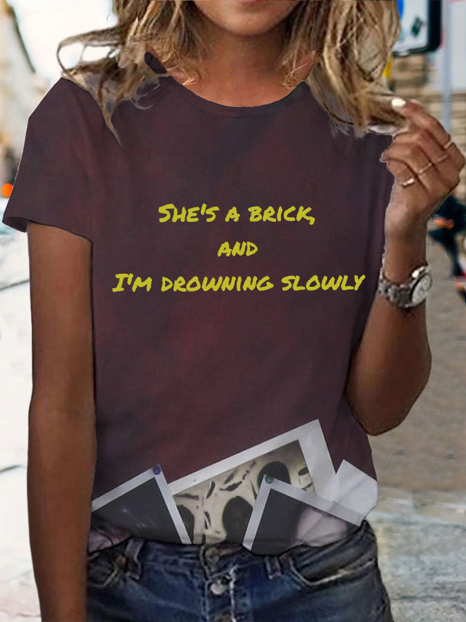 Women's She's a brick, and I'm drowning slowly lyrics T-shirt