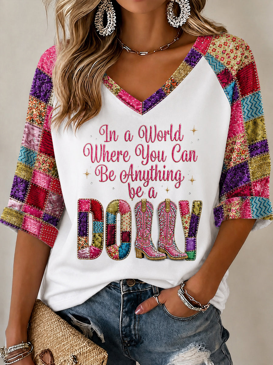Women's In A World Where You Can Be Anything Be A Dolly Patchwork Print Half-Sleeve V-Neck T-Shirt